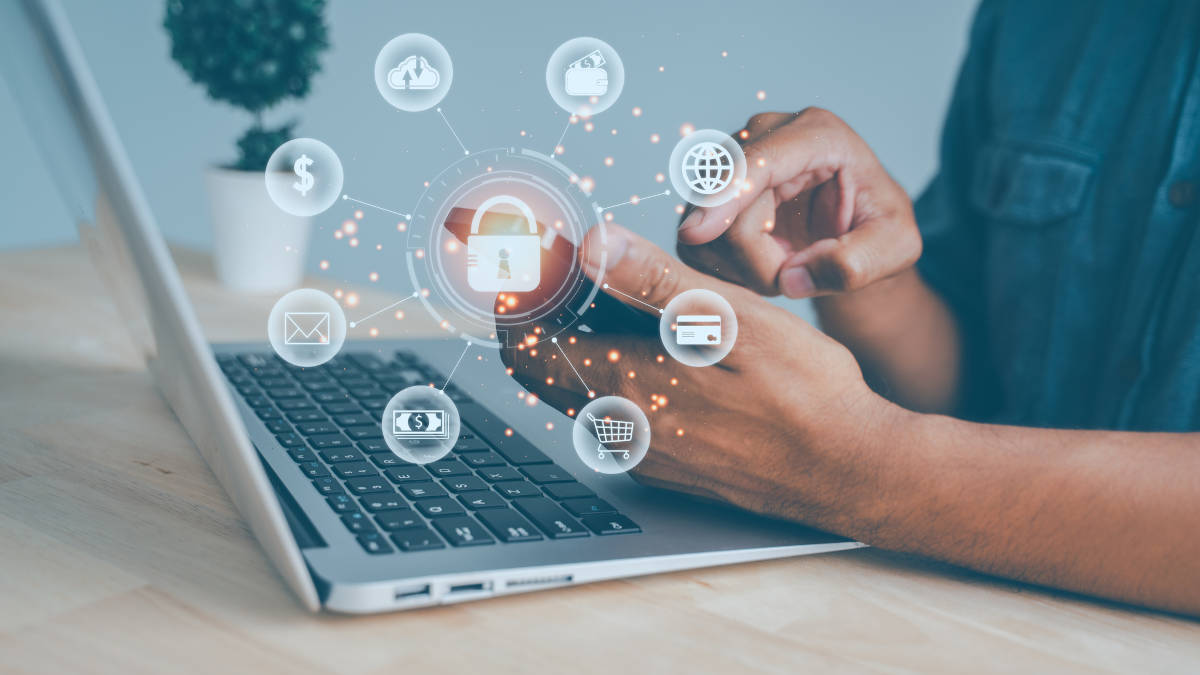 Man using smartphone and laptop with icon graphic Cyber security network of connected devices and personal data security