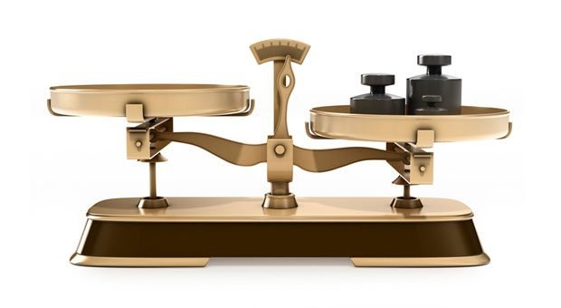 "Wenn Sie weniger zahlen, bekommen Sie auch weniger Leistung" - diese Botschaft vermittelt unser Blogger seinen Kunden mithilfe der Honorar-Waage.