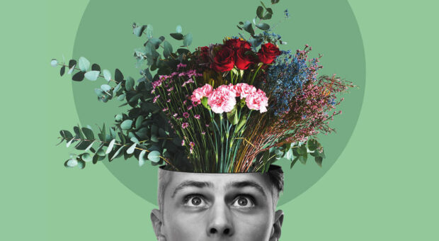 Eine Collage mit einem Kopf in schwarz-weiß, aus dem, wie aus einer Vase, ein Blumenstrauß heraus schaut.